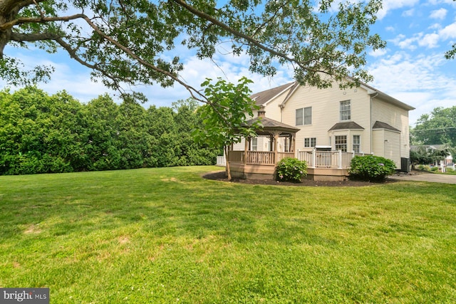 9710 Magledt Rd, Baltimore, MD 21234 - view of grassy yard featuring a wooden deck and a gazebo