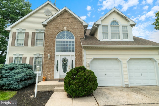 9710 Magledt Rd, Baltimore, MD 21234 - view of front of house with concrete driveway, a shingled roof, and brick siding