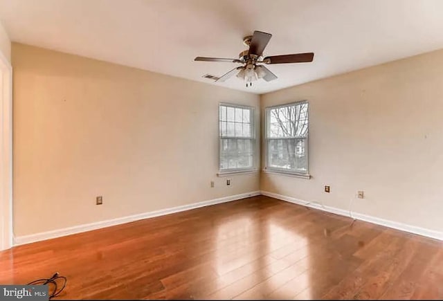 6608 Rapid Water Way Unit 304, Glen Burnie, MD 21060 - unfurnished room featuring wood finished floors, ceiling fan, and baseboards