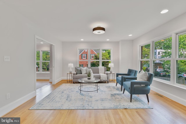 5001 14th St N, Arlington, VA 22205 - living area featuring baseboards, wood finished floors, and recessed lighting