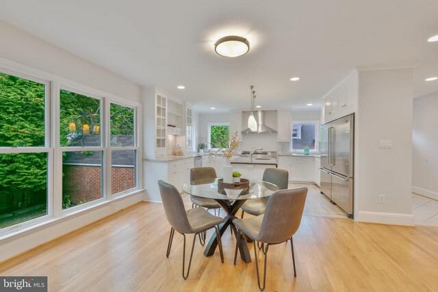 5001 14th St N, Arlington, VA 22205 - dining area with baseboards, light wood-type flooring, and recessed lighting