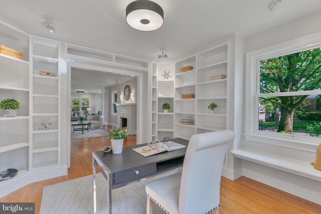 5001 14th St N, Arlington, VA 22205 - office area featuring plenty of natural light, wood finished floors, and a fireplace