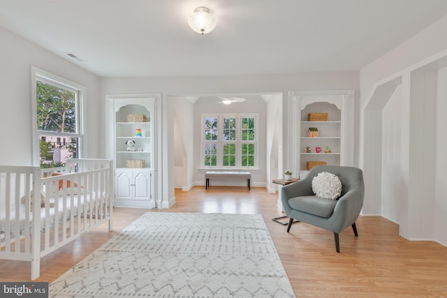 5001 14th St N, Arlington, VA 22205 - living area with light wood-style flooring and baseboards