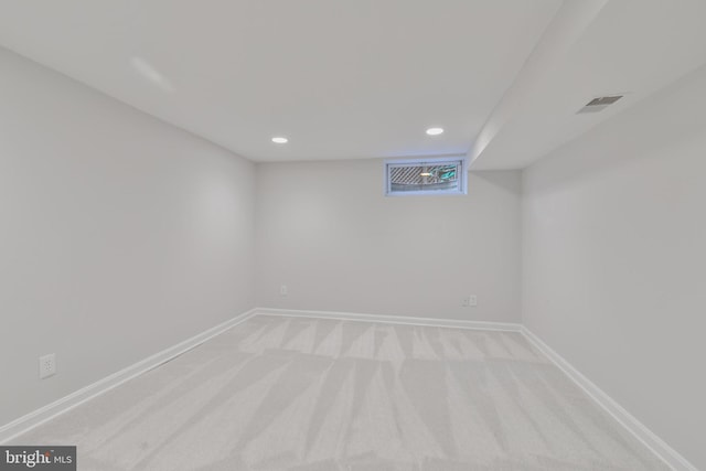 5001 14th St N, Arlington, VA 22205 - finished below grade area with light carpet, recessed lighting, and baseboards