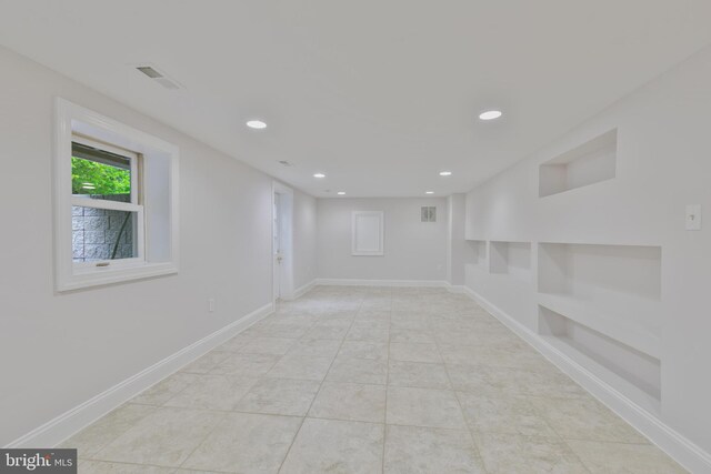 5001 14th St N, Arlington, VA 22205 - unfurnished room with built in features, baseboards, recessed lighting, and tile patterned floors