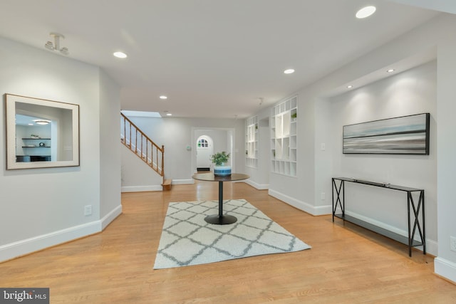 5001 14th St N, Arlington, VA 22205 - foyer with stairs, recessed lighting, light wood finished floors, and baseboards