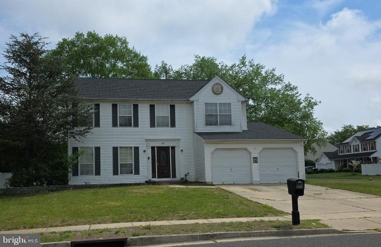67 Larkspur Cir, Sicklerville, NJ 08081 - view of front of house featuring driveway and a front lawn