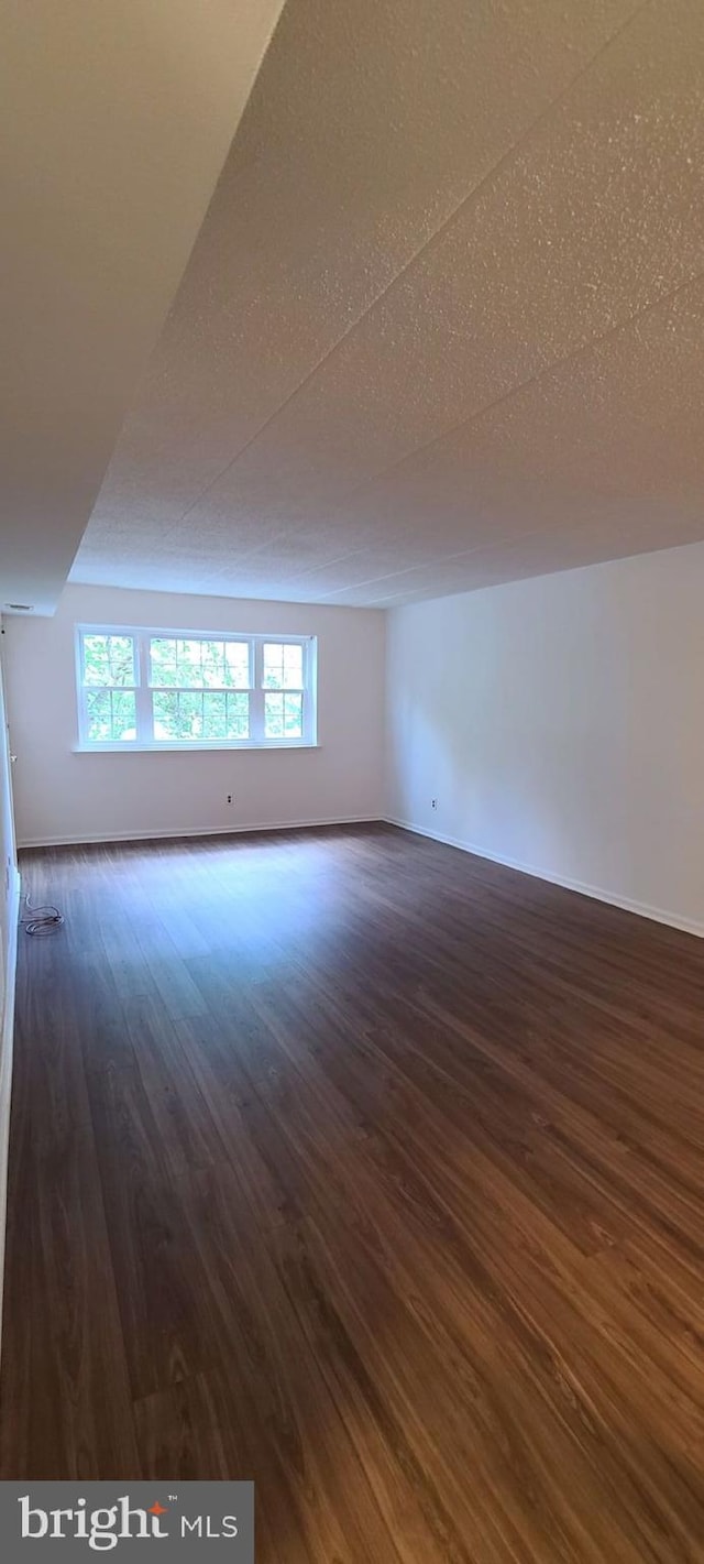178 Woodstream Building 5, Norristown, PA 19403 - bonus room featuring dark wood-style floors and baseboards