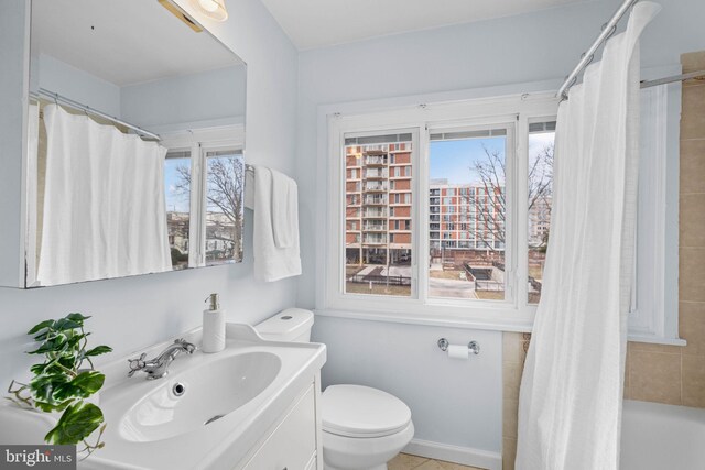 320 G St SW, Washington, DC 20024 - bathroom with toilet, vanity, and plenty of natural light