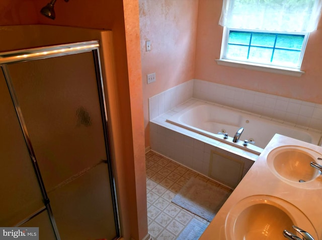 126 Creek Bend Rd, Dover, DE 19904 - full bathroom featuring a bath, a shower stall, and double vanity
