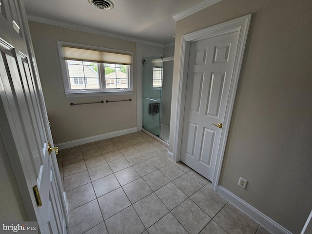 204 Turtle Cv Unit 116, Laurel, DE 19956 - doorway to outside with light tile patterned flooring, baseboards, and ornamental molding