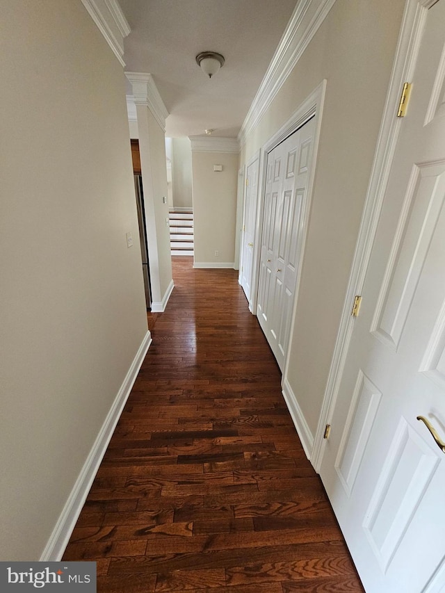 204 Turtle Cv Unit 116, Laurel, DE 19956 - hallway with dark wood finished floors, ornamental molding, baseboards, and ornate columns