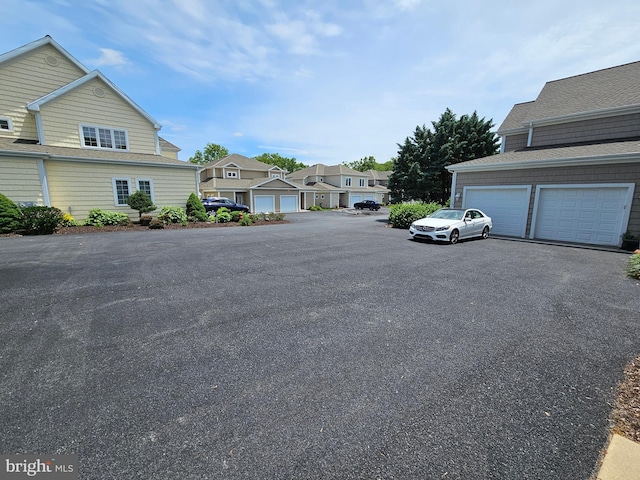 204 Turtle Cv Unit 116, Laurel, DE 19956 - view of asphalt road featuring a residential view