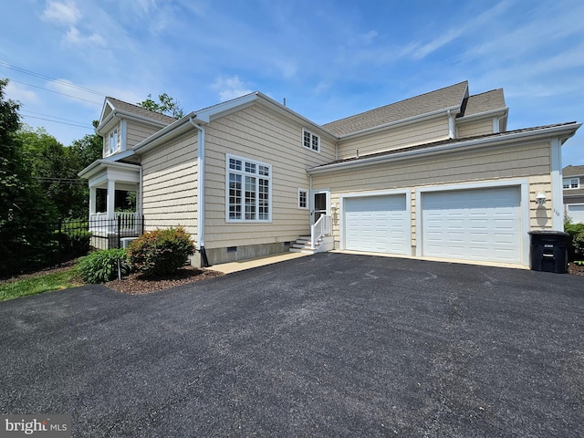 204 Turtle Cv Unit 116, Laurel, DE 19956 - view of front facade featuring driveway, a garage, crawl space, and entry steps