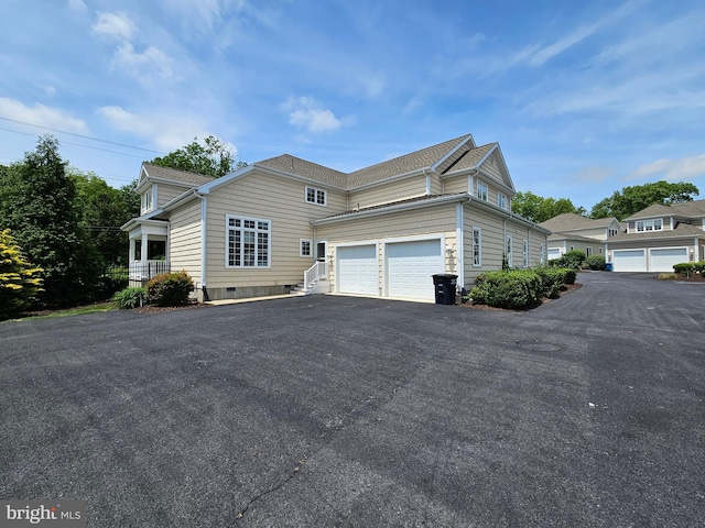 204 Turtle Cv Unit 116, Laurel, DE 19956 - view of side of property with driveway and an attached garage