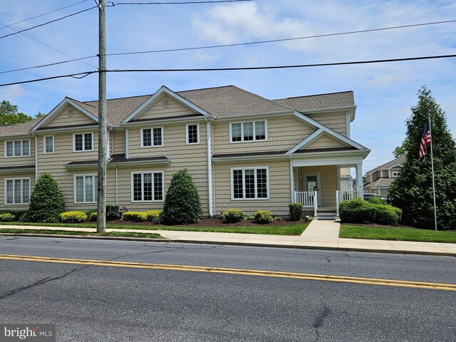204 Turtle Cv Unit 116, Laurel, DE 19956 - view of front of property featuring covered porch and a shingled roof