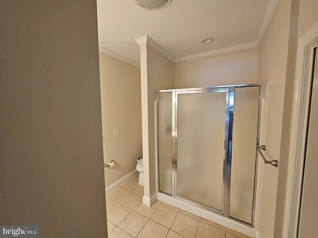 204 Turtle Cv Unit 116, Laurel, DE 19956 - full bathroom with a stall shower, tile patterned floors, crown molding, toilet, and baseboards