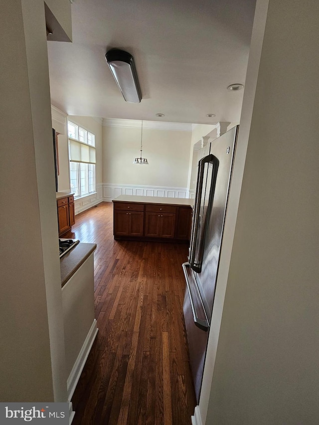 204 Turtle Cv Unit 116, Laurel, DE 19956 - corridor featuring dark wood-style floors and wainscoting
