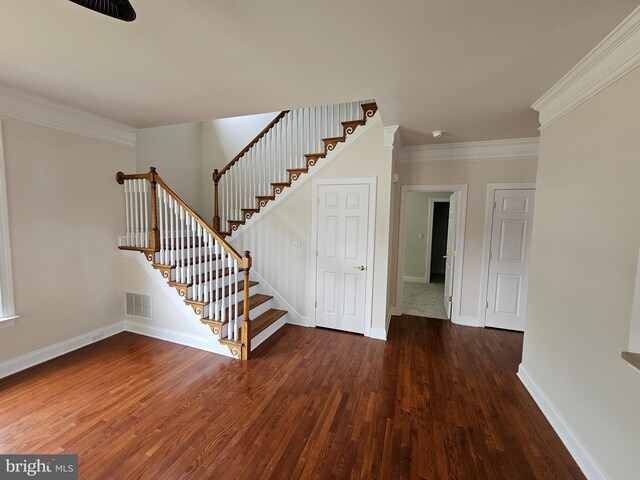 204 Turtle Cv Unit 116, Laurel, DE 19956 - stairway featuring wood finished floors, baseboards, and crown molding