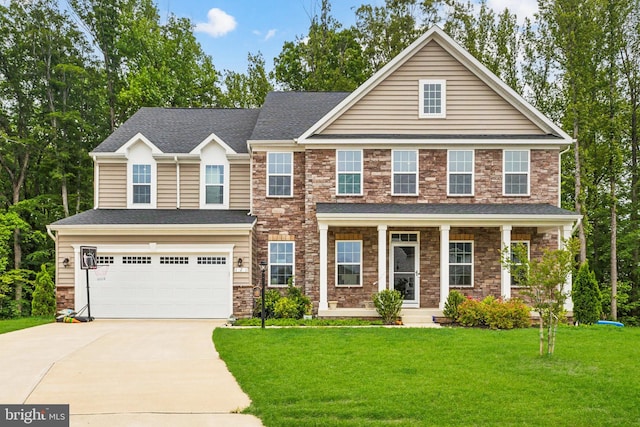 121 Mountain Path Ln, Stafford, VA 22554 - view of front of property with driveway, a garage, a front lawn, and stone siding