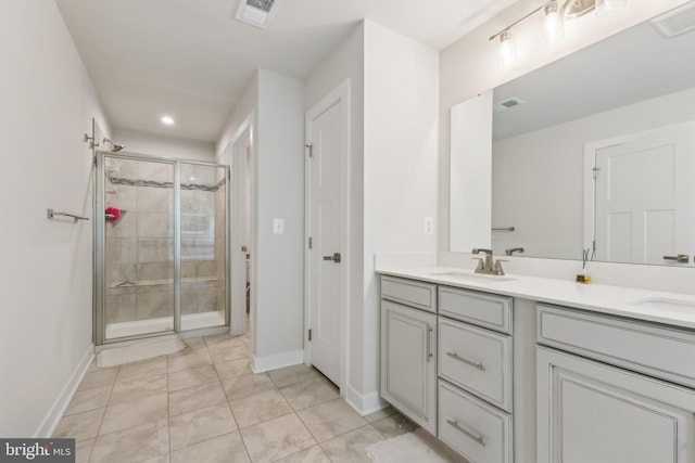 121 Mountain Path Ln, Stafford, VA 22554 - full bathroom with double vanity, a stall shower, baseboards, recessed lighting, and tile patterned flooring