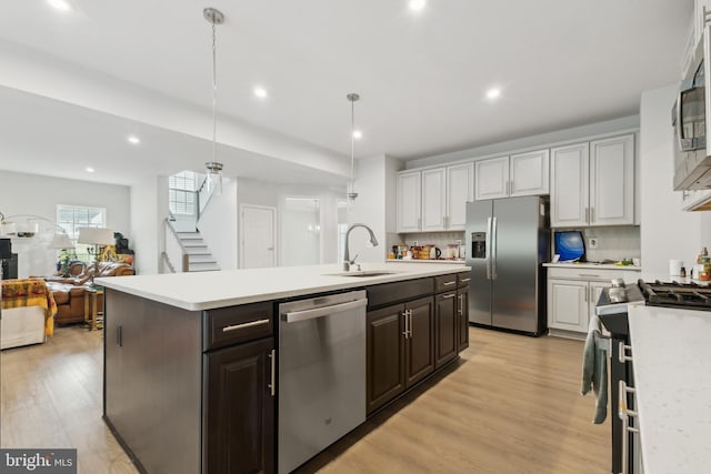 121 Mountain Path Ln, Stafford, VA 22554 - kitchen with appliances with stainless steel finishes, light countertops, a sink, and recessed lighting