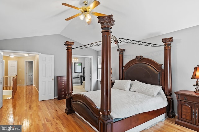 10604 Sourwood Ct, Laurel, MD 20723 - bedroom with vaulted ceiling and light wood finished floors