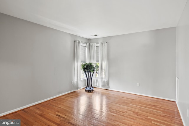 10604 Sourwood Ct, Laurel, MD 20723 - spare room with wood finished floors and baseboards