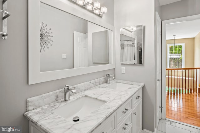 10604 Sourwood Ct, Laurel, MD 20723 - bathroom featuring double vanity and marble finish flooring