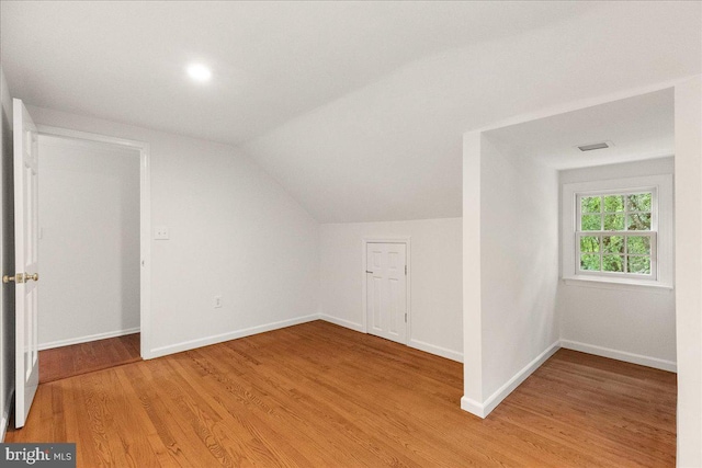 33 Duffield Pl, Princeton, NJ 08540 - bonus room with light wood-style flooring, lofted ceiling, and baseboards