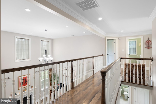 213 Athena Ct, Wilmington, DE 19808 - hallway with a chandelier, wood finished floors, recessed lighting, crown molding, and an upstairs landing