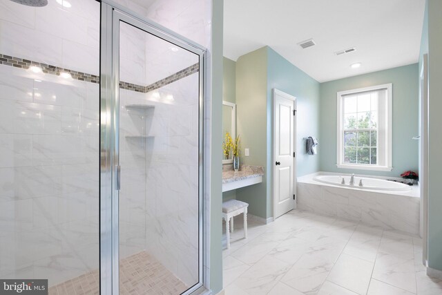 213 Athena Ct, Wilmington, DE 19808 - bathroom with a garden tub, a shower stall, marble finish flooring, and baseboards