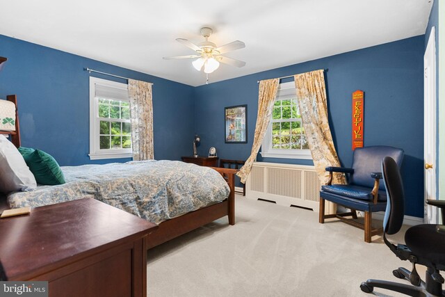 625 Lindley Rd, Glenside, PA 19038 - bedroom with multiple windows, light colored carpet, ceiling fan, and baseboards