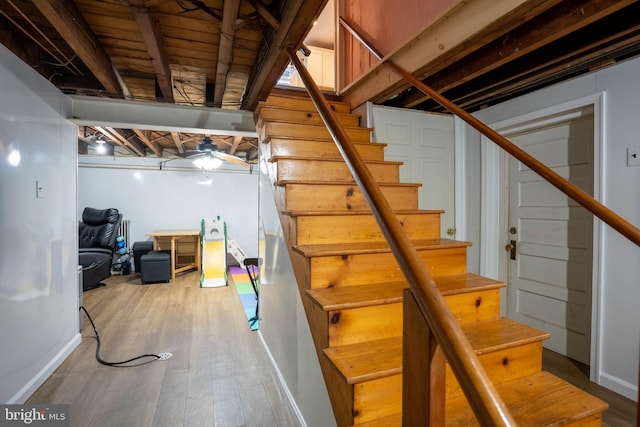 625 Lindley Rd, Glenside, PA 19038 - finished basement with stairs, wood finished floors, and baseboards