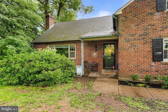 625 Lindley Rd, Glenside, PA 19038 - view of front of property with a chimney and brick siding