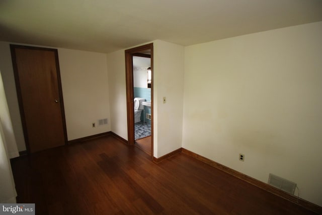 65 Albert Ave, Milltown, NJ 08850 - unfurnished room featuring dark wood-style flooring and baseboards