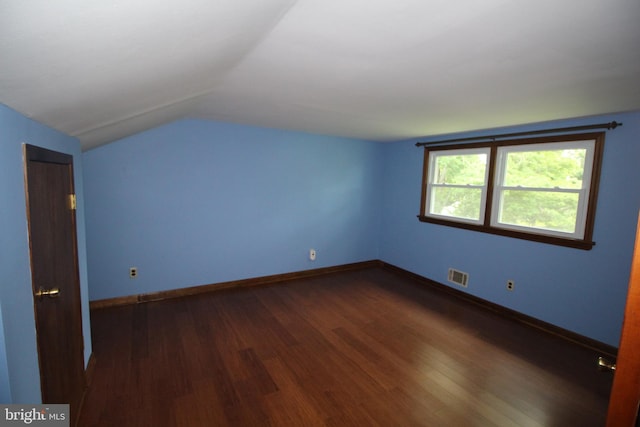 65 Albert Ave, Milltown, NJ 08850 - bonus room featuring dark wood-style floors, vaulted ceiling, and baseboards