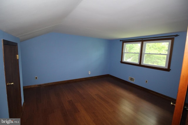 65 Albert Ave, Milltown, NJ 08850 - bonus room with dark wood finished floors, lofted ceiling, and baseboards