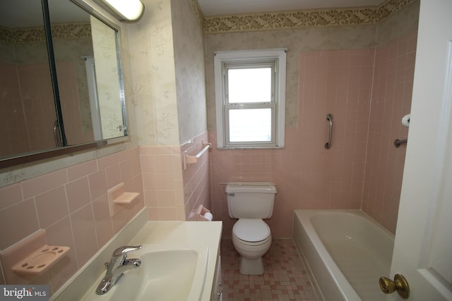 65 Albert Ave, Milltown, NJ 08850 - full bathroom with toilet, tile patterned floors, tile walls, wallpapered walls, and vanity