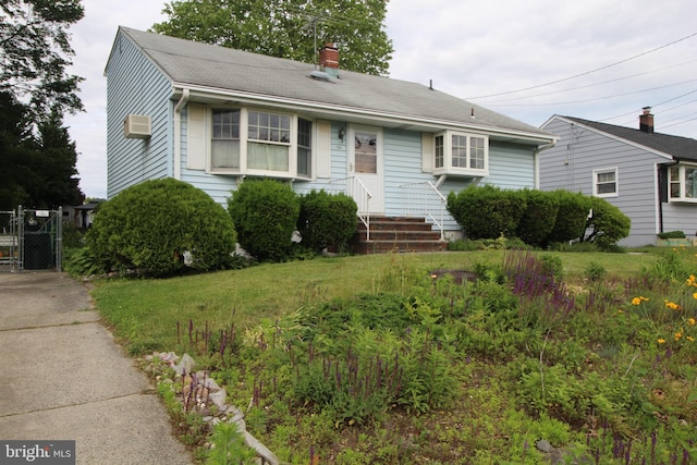 65 Albert Ave, Milltown, NJ 08850 - bungalow-style home featuring a chimney, a gate, and a wall unit AC