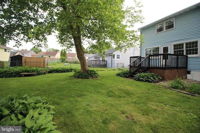 65 Albert Ave, Milltown, NJ 08850 - view of yard featuring a deck, a residential view, and stairs