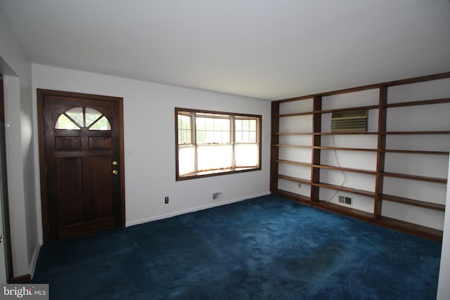 65 Albert Ave, Milltown, NJ 08850 - foyer featuring dark colored carpet, plenty of natural light, and baseboards