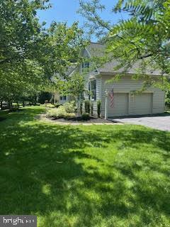 46 Harness Creek View Ct, Annapolis, MD 21403 - view of front of house featuring a front lawn and a garage