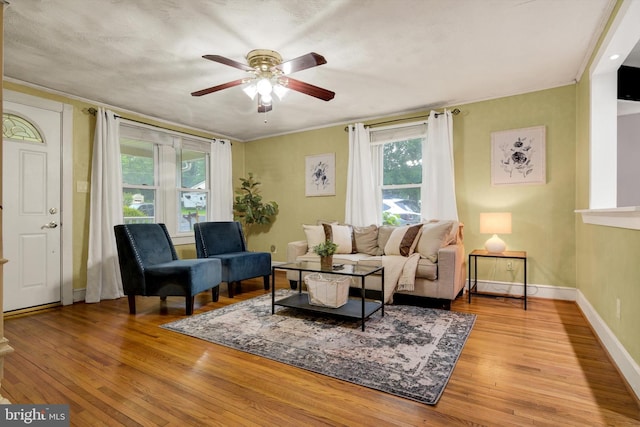 1768 Glen Cove Rd, Darlington, MD 21034 - living area featuring plenty of natural light, hardwood / wood-style flooring, ceiling fan, baseboards, and crown molding