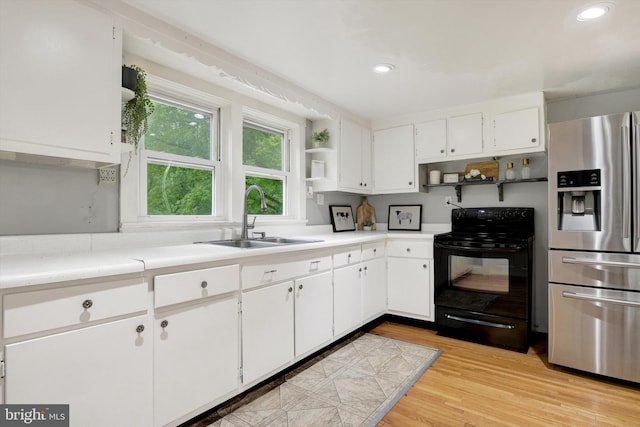 1768 Glen Cove Rd, Darlington, MD 21034 - kitchen with stainless steel fridge with ice dispenser, black electric range oven, open shelves, a sink, and white cabinets