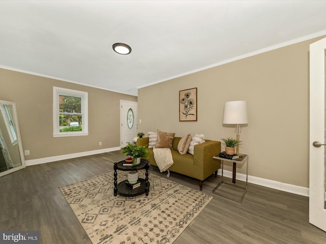 8709 Bradford Rd, Silver Spring, MD 20901 - living room with ornamental molding, dark wood finished floors, and baseboards