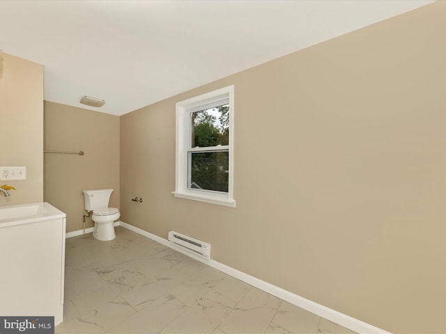 8709 Bradford Rd, Silver Spring, MD 20901 - bathroom featuring a baseboard radiator, marble finish flooring, toilet, and baseboards