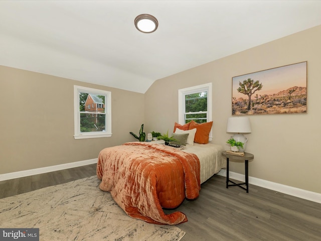 8709 Bradford Rd, Silver Spring, MD 20901 - bedroom with baseboards, wood finished floors, and vaulted ceiling