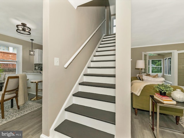 8709 Bradford Rd, Silver Spring, MD 20901 - stairs featuring wood finished floors and plenty of natural light