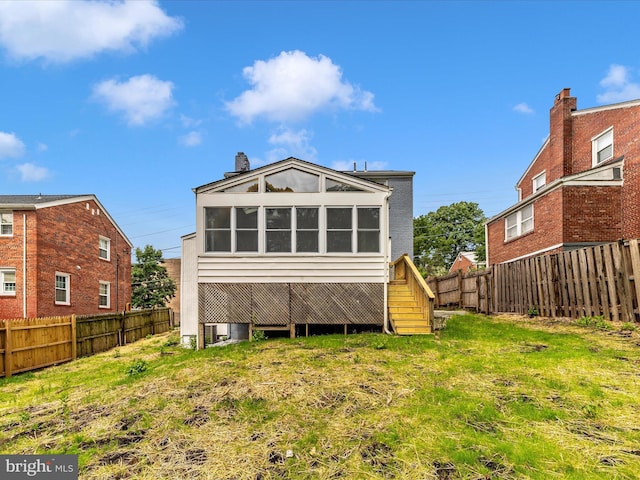 8709 Bradford Rd, Silver Spring, MD 20901 - back of property with a fenced backyard and stairway